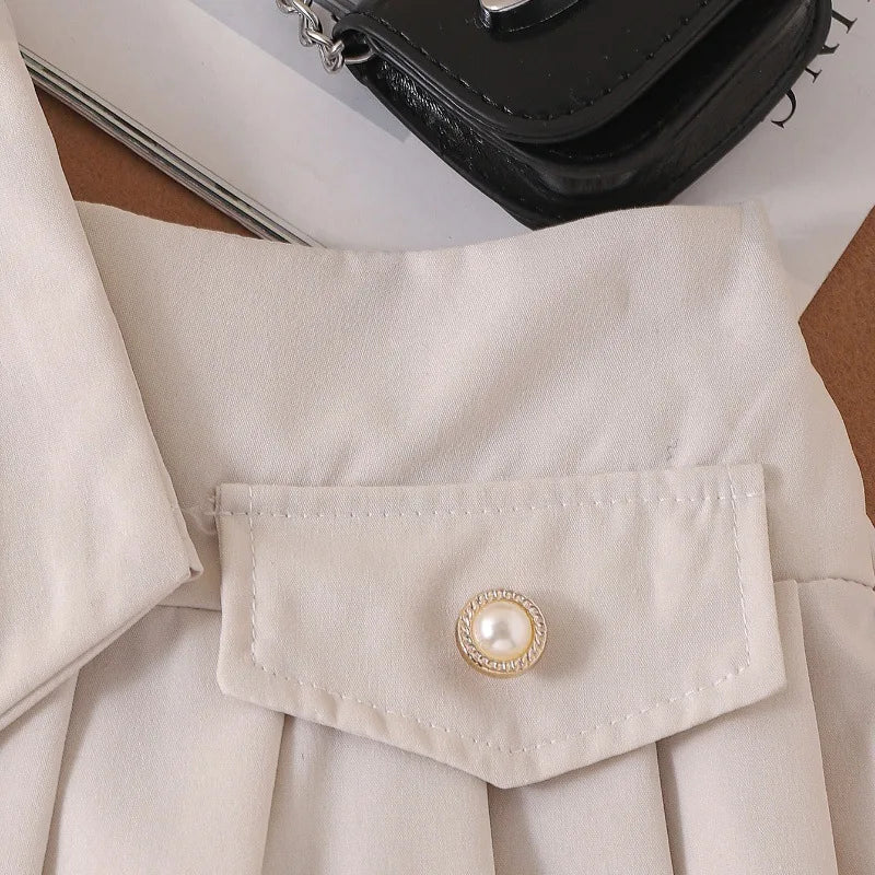 Sleeveless Button Vest and Pleated Skirt Outfit