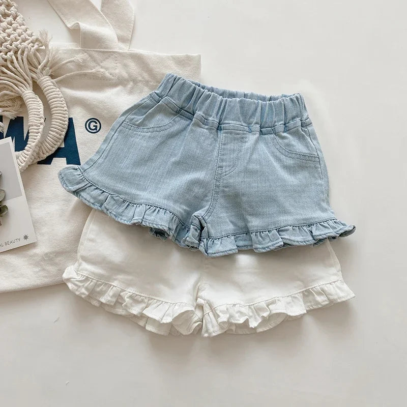 Girls Solid Ruffle Hem Elastic Waist Shorts