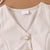 Sleeveless Button Vest and Pleated Skirt Outfit