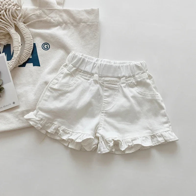 Girls Solid Ruffle Hem Elastic Waist Shorts