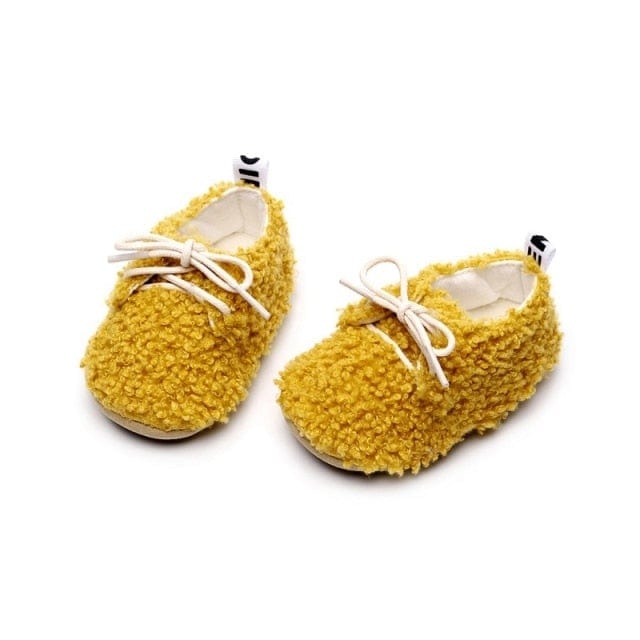 Baby shoes with pom on sale poms